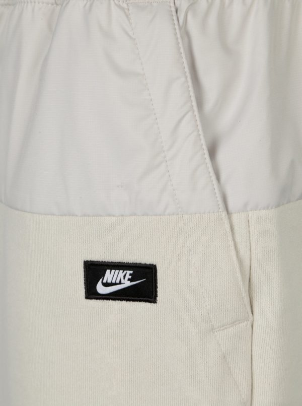 Krémové pánske kraťasy s pružným pásom Nike