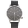 Unisex hodinky v striebornej farbe s čiernym koženým remienkom Komono Winston Regal
