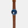 Unisex hodinky v striebornej farbe s hnedým koženým remienkom Komono Winston Subs