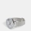 Dámske hodinky s remienkom v striebornej farbe a mramorovaným ciferníkom Komono Silver White Marble