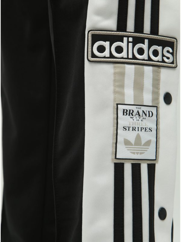 Čierne dámske tepláky s nášivkou adidas Originals Adibreak