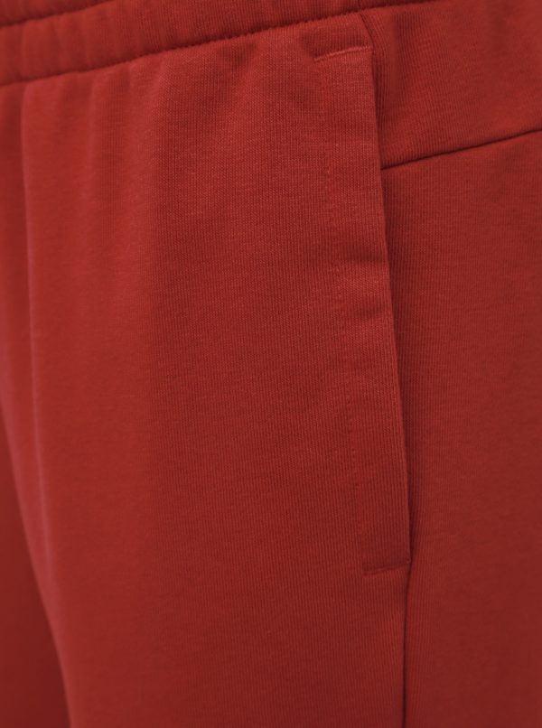 Červené dámske slim fit tepláky adidas CORE
