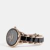 Dámske hodinky s kovovým remienkom v čiernej a zlatej farbe Lee Cooper